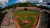 FILE - River Ridge, Louisiana, lines the third baseline and Curacao lines the first baseline during team introductions before the Little League World Series Championship game at Lamade Stadium in South Williamsport, Pa., Sunday, Aug. 25, 2019. The Little League World Series is back. There won’t be international teams or 22,000 fans in the stands for the championship, but the tournament in South Williamsport, Pennsylvania, is set to start on Thursday, Aug. 19, 2021. (AP Photo/Gene J. Puskar)