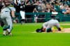 Oakland Athletics catcher Sean Murphy runs to starting pitcher Chris Bassitt after Bassitt was hit in the head from a ball hit by Chicago White Sox's Brian Goodwin during the second inning of a baseball game, Tuesday, Aug. 17, 2021, in Chicago. (AP Photo/Charles Rex Arbogast)