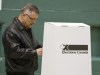 Liberal candidate Ralph Goodale marks his voter card at Marion McVeety Elementary School in his Wascana Constituency on Tuesday, Oct. 14, 2008 in Regina. The federal election isnt expected to produce much change in the Prairies provinces, but some academics in political science say if there are ridings to watch, they are in urban areas.THE CANADIAN PRESS/Troy Fleece