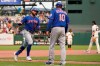 New York Mets' Kevin Pillar, left, is congratulated by third base coach Gary Disarcina (10) after hitting a three-run home run against the San Francisco Giants during the 12th inning of a baseball game in San Francisco, Wednesday, Aug. 18, 2021. (AP Photo/Jeff Chiu)