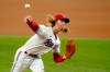 Texas Rangers starting pitcher Mike Foltynewicz throws in the first inning of a baseball game against the Seattle Mariners in Arlington, Texas, Wednesday, Aug. 18, 2021. (AP Photo/Tony Gutierrez)