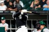 Chicago White Sox's Luis Robert watches his RBI single off Oakland Athletics starting pitcher Paul Blackburn during the fourth inning of a baseball game Wednesday, Aug. 18, 2021, in Chicago. (AP Photo/Charles Rex Arbogast)