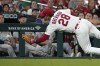 St. Louis Cardinals third baseman Nolan Arenado dives but is unable to catch a foul ball by Milwaukee Brewers' Omar Narvaez during the sixth inning of a baseball game Wednesday, Aug. 18, 2021, in St. Louis. (AP Photo/Jeff Roberson)