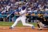 Los Angeles Dodgers' Max Muncy connects for a two-run home run during the first inning of the team's baseball game against the Pittsburgh Pirates on Wednesday, Aug. 18, 2021, in Los Angeles. (AP Photo/Marcio Jose Sanchez)