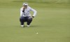 United States' Nelly Korda looks at her putt on the 18th green during the first round of the Women's British Open golf championship, in Carnoustie, Scotland, Thursday, Aug. 19, 2021. (AP Photo/Scott Heppell)