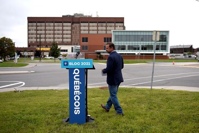 Bloc Quebecois Leader Yves-Francois Blanchet arrives to speak at a campaign event outside the Gatineau Hospital in Gatineau, Que., on Thursday, Aug. 19, 2021. THE CANADIAN PRESS/Justin Tang