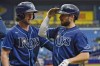 Tampa Bay Rays' Brandon Lowe, right, celebrates with Brett Phillips after Lowe hit a two-run home run off Baltimore Orioles pitcher Jorge Lopez during the second inning of a baseball game Thursday, Aug. 19, 2021, in St. Petersburg, Fla. (AP Photo/Chris O'Meara)