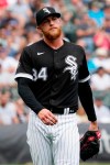 Chicago White Sox relief pitcher Michael Kopech reacts as he looks to first base during the seventh inning of a baseball game against the Oakland Athletics in Chicago, Thursday, Aug. 19, 2021. (AP Photo/Nam Y. Huh)