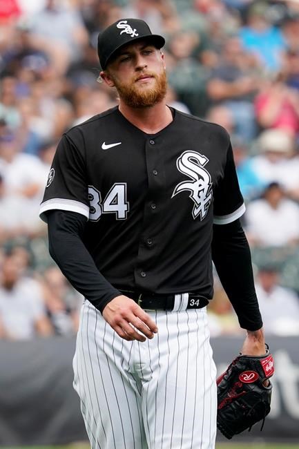 Chicago White Sox relief pitcher Michael Kopech reacts as he looks to first base during the seventh inning of a baseball game against the Oakland Athletics in Chicago, Thursday, Aug. 19, 2021. (AP Photo/Nam Y. Huh)