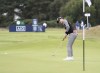 United States' Jennifer Song putt on the 13th green during the second round of the Women's British Open golf championship, in Carnoustie, Scotland, Friday, Aug. 20, 2021. (AP Photo/Scott Heppell)