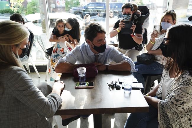 Supporters look on as Liberal Leader Justin Trudeau holds a campaign event in Calgary, Alberta, on Thursday, Aug 19, 2021. THE CANADIAN PRESS/Sean Kilpatrick
