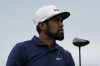 Tony Finau watches his shot off the seventh tee in the second round at the Northern Trust golf tournament, Friday, Aug. 20, 2021, at Liberty National Golf Course in Jersey City, N.J. (AP Photo/John Minchillo)