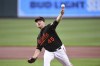 Baltimore Orioles starting pitcher Keegan Akin throws during the first inning of the team's baseball game against the Atlanta Braves, Friday, Aug. 20, 2021, in Baltimore. (AP Photo/Terrance Williams)
