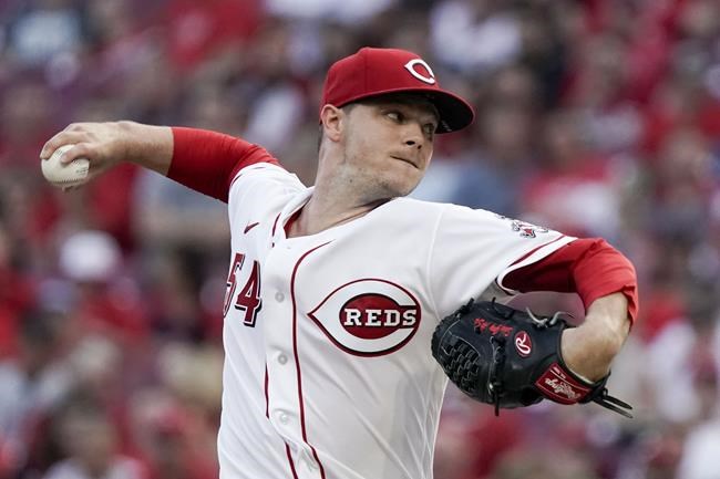 Cincinnati Reds starting pitcher Sonny Gray (54) throws during the first inning of a baseball game against the Miami Marlins, Friday, Aug. 20, 2021, in Cincinnati. (AP Photo/Jeff Dean)