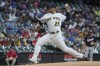 Milwaukee Brewers starting pitcher Brett Anderson throws during the first inning of a baseball game against the Washington Nationals Friday, Aug. 20, 2021, in Milwaukee. (AP Photo/Morry Gash)