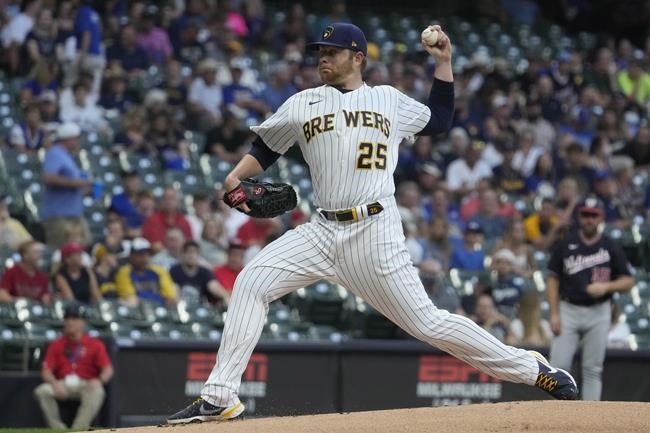 Milwaukee Brewers starting pitcher Brett Anderson throws during the first inning of a baseball game against the Washington Nationals Friday, Aug. 20, 2021, in Milwaukee. (AP Photo/Morry Gash)