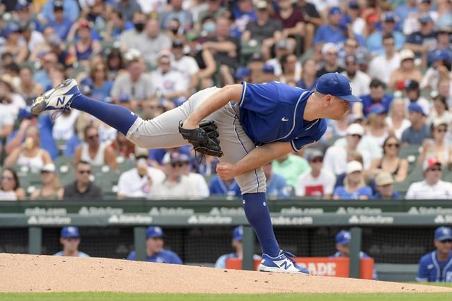 Kansas City Royals starting pitcher Kris Bubic (50) throws against the Chicago Cubs during the first inning of a baseball game, Saturday, Aug. 21, 2021, in Chicago. (AP Photo/Mark Black)