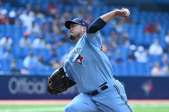 Toronto Blue Jays’ Hyun Jin Ryu pitches in the first inning of an American League baseball game against the Detroit Tigers, in Toronto on Saturday, Aug. 21, 2021. Ryu pitched seven scoreless innings, and Randal Grichuk smacked a two-run homer in the second inning to halt the Blue Jays three-game losing streak. THE CANADIAN PRESS/Jon Blacker