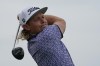Cameron Smith, of Australia, watches his shot off the third tee in the second round at the Northern Trust golf tournament, Friday, Aug. 20, 2021, at Liberty National Golf Course in Jersey City, N.J. (AP Photo/John Minchillo)