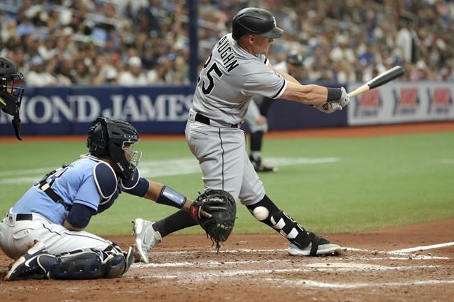 Chicago White Sox's Andrew Vaughn strikes out in front of Tampa Bay Rays catcher Francisco Mejia to end the sixth inning of a baseball game Sunday, Aug. 22, 2021, in St. Petersburg, Fla. (AP Photo/Mike Carlson)