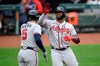 Atlanta Braves' Jorge Soler, right, celebrates his home run with Freddie Freeman (5) during the fourth inning of a baseball game against the Baltimore Orioles, Sunday, Aug. 22, 2021, in Baltimore. (AP Photo/Nick Wass)