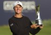 Sweden's Anna Nordqvist poses for the media holding the trophy after winning the Women's British Open golf championship, during the presentation ceremony in Carnoustie, Scotland, Sunday, Aug. 22, 2021. (AP Photo/Scott Heppell)
