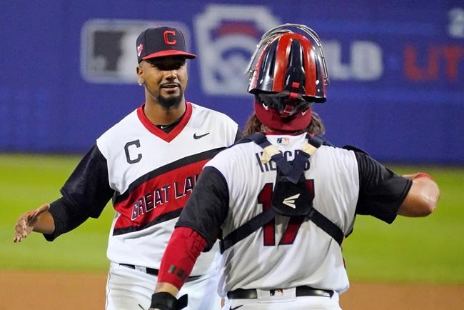 Cleveland Indians relief pitcher Emmanuel Clase, left, celebrates with catcher Austin Hedges after getting the final out of a 3-0 win over the Los Angeles Angels in the Little League Classic baseball game at Bowman Stadium in Williamsport, Pa., Sunday, Aug. 22, 2021. (AP Photo/Gene J. Puskar)
