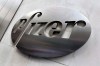 FILE - This Dec. 4, 2017, file photo shows the Pfizer company logo at the company's headquarters in New York. THE CANADIAN PRESS/AP-Richard Drewm Fuke