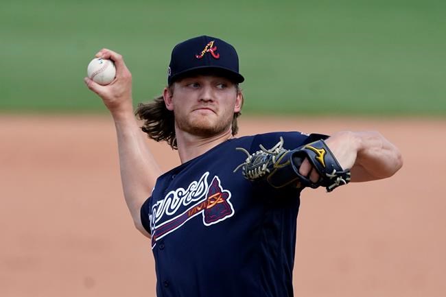 FILE - In this March 30, 2021, file photo, Atlanta Braves starting pitcher Mike Soroka delivers in the sixth inning of a spring training baseball game against the Boston Red Sox in Fort Myers, Fla. Soroka spoke Monday, Aug. 23, 2021, for the first time since getting the shocking news that he re-tore his Achilles tendon and would need another major operation. (AP Photo/John Bazemore, File)