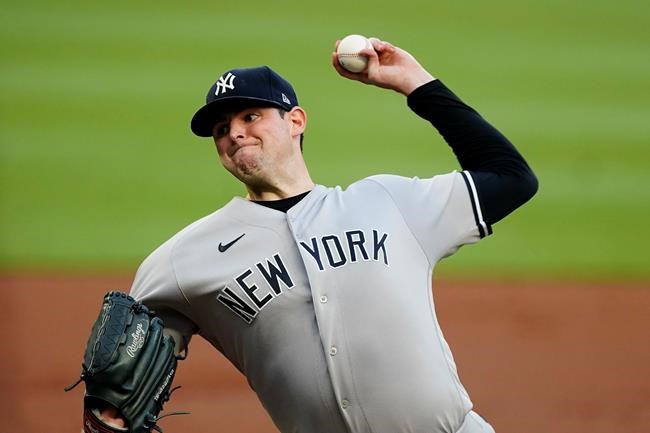 New York Yankees starting pitcher Jordan Montgomery works in the first during a baseball game against the Atlanta Braves, Monday, Aug. 23, 2021, in Atlanta. (AP Photo/John Bazemore)