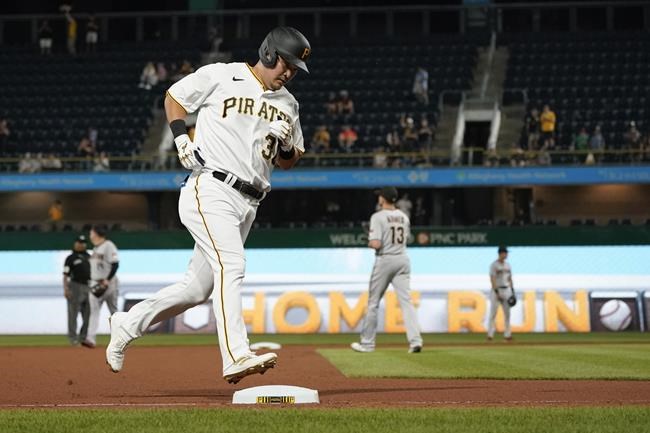 Pittsburgh Pirates' Yoshi Tsutsugo (32) rounds the bases after hitting a solo home run in the seventh inning of a baseball game against the Arizona Diamondbacks, Monday, Aug. 23, 2021, in Pittsburgh. (AP Photo/Keith Srakocic)