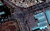 This satellite image provided by Maxar Technologies shows crowds and traffic at the entrance to Kabul’s international airport on Monday, Aug. 23, 2021. (Satellite Image ©2021 Maxar Technologies via AP)
