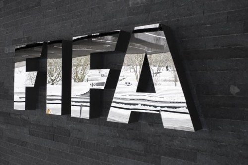 FILE - In this Tuesday, Jan. 10. 2017 file photo, the FIFA logo is pictured at the Home of FIFA in Zurich, Switzerland. FIFA is facing an escalating backlash across soccer over the decision to ignore concerns of clubs and leagues and squeeze more World Cup qualifiers into September and overlook coronavirus-related quarantine requirements. Premier League clubs were holding talks on Tuesday, Aug, 24, 2021 about forming a unified position to block players going to countries on England’s red list which also features several South American countries, including Argentina, Brazil, Chile and Peru. (Ennio Leanza/Keystone via AP, file)