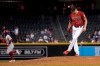 Arizona Diamondbacks relief pitcher Caleb Smith (31) kicks the dirt on the mound after giving up a home run to Philadelphia Phillies' Odubel Herrera, left, during the eighth inning of a baseball game Wednesday, Aug. 18, 2021, in Phoenix. The Diamondbacks won 4-2. (AP Photo/Ross D. Franklin)