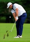 Patrick Reed of United States plays a shot from the second fairway during the third round of the men's golf event at the 2020 Summer Olympics on Saturday, July 31, 2021, in Kawagoe, Japan. (AP Photo/Andy Wong)