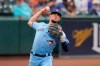 Toronto Blue Jays third baseman Cavan Biggio throws to first base on a ground out by Baltimore Orioles' Ramon Urias during the second inning of a baseball game, Wednesday, July 7, 2021, in Baltimore. THE CANADIAN PRESS/AP, Julio Cortez