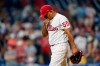 Philadelphia Phillies pitcher Ranger Suarez walks to the dugout after being pulled during the seventh inning of an interleague baseball game against the Tampa Bay Rays, Tuesday, Aug. 24, 2021, in Philadelphia. (AP Photo/Matt Slocum)