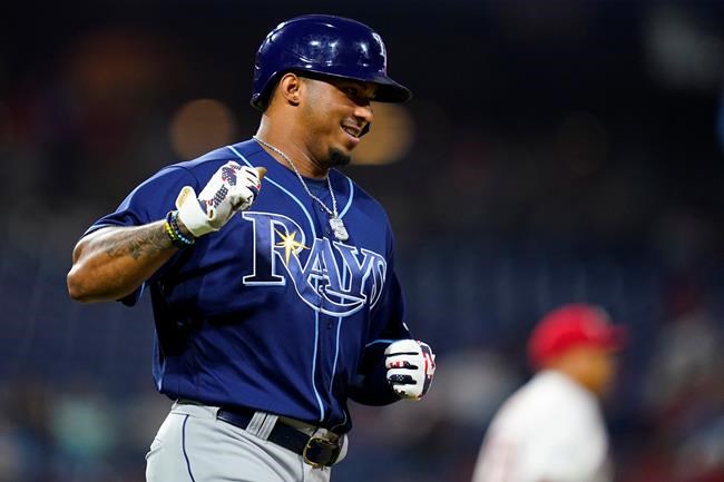 Tampa Bay Rays' Wander Franco reacts after hitting a single off Philadelphia Phillies pitcher Ranger Suarez during the fourth inning of an interleague baseball game, Tuesday, Aug. 24, 2021, in Philadelphia. (AP Photo/Matt Slocum)