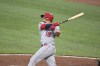 Los Angeles Angels' Juan Lagares (19) watches his two-run home run which scored Los Angeles Angels' Jo Adell hit against Baltimore Orioles starting pitcher Spenser Watkins during the second inning of a baseball game Tuesday, Aug. 24, 2021, in Baltimore. (AP Photo/Terrance Williams)