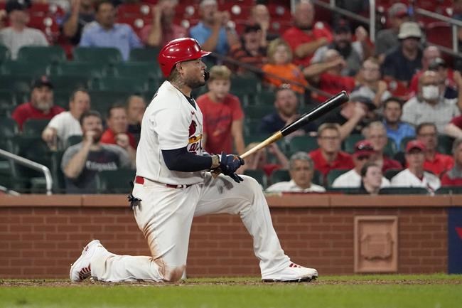 St. Louis Cardinals' Yadier Molina after striking out to end the eighth inning of a baseball game against the Detroit Tigers Tuesday, Aug. 24, 2021, in St. Louis. (AP Photo/Jeff Roberson)