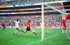 FILE - In this file photo dated June 3, 1970, Wilfried Jan Van Moer, red shirt at centre, scores his second goal for Belgium against El Salvador, in Group A qualifying round of World Cup soccer action at Azteca Stadium in Mexico City, Mexico. Belgium won 3-0. The Belgian Football Association said Wednesday Aug. 25, 2021, that Belgium soccer great Wilfried van Moer, nicknamed the “Little General,