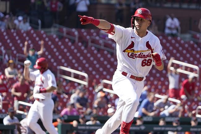 St. Louis Cardinals' Lars Nootbaar (68) celebrates after hitting a walk-off single as Paul Goldschmidt, left, come in to score the game-winning run during the 10th inning of a baseball game against the Detroit Tigers Wednesday, Aug. 25, 2021, in St. Louis. (AP Photo/Jeff Roberson)