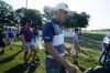 Michael Phelps, left, walks with Jordan Spieth to the 12th tee box during the ProAm at the BMW Championship golf tournament, Wednesday, Aug. 25, 2021, at Caves Valley Golf Club in Owings Mills, Md. The BMW Championship tournament begins Thursday. (AP Photo/Julio Cortez)