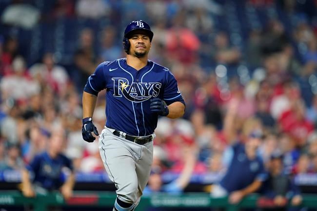 Tampa Bay Rays' Francisco Mejia runs the bases after hitting a three-run home run off Philadelphia Phillies pitcher Zack Wheeler during the ninth inning of an interleague baseball game, Wednesday, Aug. 25, 2021, in Philadelphia. (AP Photo/Matt Slocum)