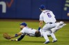 New York Mets' Michael Conforto, left, loses control of a ball hit by San Francisco Giants' Alex Dickerson for a single as Jeff McNeil, right, watches during the seventh inning of a baseball game Wednesday, Aug. 25, 2021, in New York. (AP Photo/Frank Franklin II)