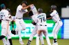 Miami Marlins' Edward Cabrera douses Jorge Alfaro after Alfaro drove in the winning run to give the team a 4-3 win in 10 innings over the Washington Nationals in a baseball game Wednesday, Aug. 25, 2021, in Miami. (AP Photo/Wilfredo Lee)