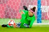 Canada's Stephanie Labbe makes a save against Sweden in the sixth round of the penalty shoot-out in the women's soccer final during the summer Tokyo Olympics in Yokohama, Japan, Friday, Aug.6, 2021. Labbe, whose penalty shootout heroics helped Canada win gold at the Tokyo Olympics, is expected to undergo a medical Thursday and sign a two-year contract with Paris Saint-Germain. THE CANADIAN PRESS/Frank Gunn