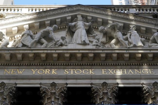 FILE - In this June 16, 2021 file photo, the facade of the New York Stock Exchange. Stocks are slightly lower on Wall Street Thursday, Aug. 26, 2021 as the market's momentum cools off following a five-day winning streak for the S&P 500. The benchmark index was down less than 0.1% in the early going. It has set more than 50 record highs this year, the latest one on Wednesday. (AP Photo/Richard Drew, File)
