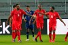 Canada forward Cyle Larin (9) celebrates his second goal against Bermuda with midfielder Atiba Hutchinson (13) and forward Junior Hoilett (10) during the first half of a World Cup 2022 Group B qualifying soccer match on March 25, 2021, in Orlando, Fla. THE CANADIAN PRESS/AP, John Raoux