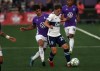 Pacific FCs' Alessandro Hojabrpour, left, looks to steal the ball away from Vancouver Whitecaps' Ryan Gauld during first half Canadian Championship Preliminary Round soccer action at Starlight Stadium in Langford, B.C., on Thursday, August 26, 2021. THE CANADIAN PRESS/Chad Hipolito